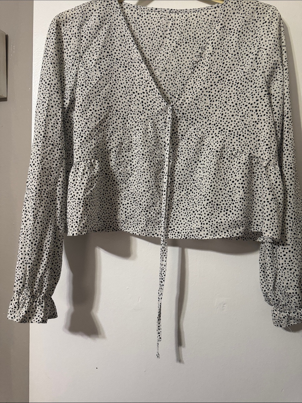 Source Unknown White V-Neck Peplum Tie-Front Blouse with Black Polka Dots